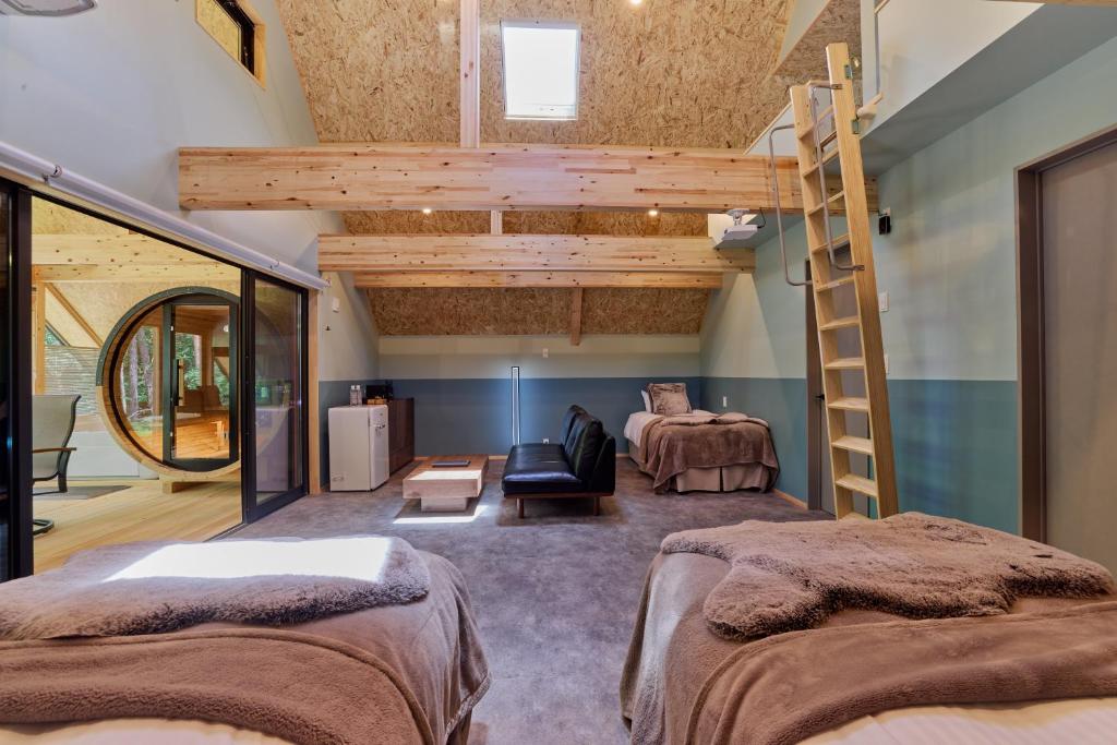 Postel nebo postele na pokoji v ubytování enico MtFuji Resort&Glamping