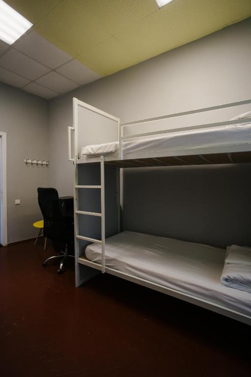 Postel nebo postele na pokoji v ubytování P2B hostel & bar