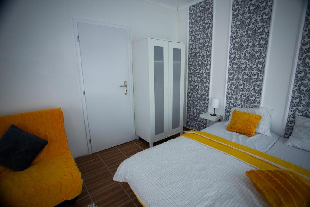 Postel nebo postele na pokoji v ubytování AG Apartment Gabčíkovo