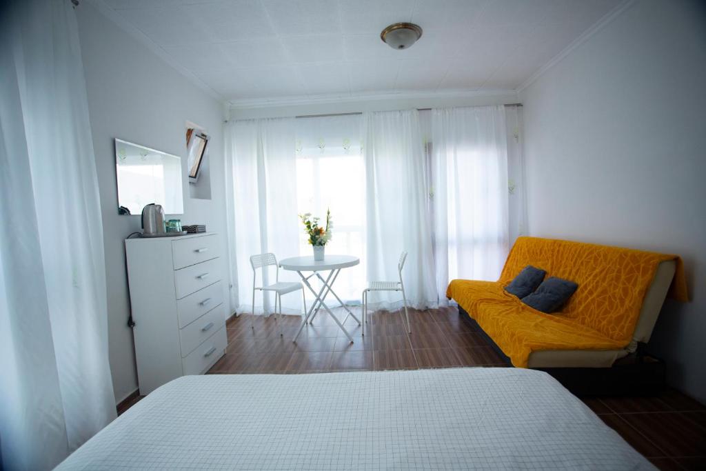 Postel nebo postele na pokoji v ubytování AG Apartment Gabčíkovo