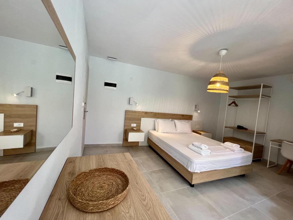 Postel nebo postele na pokoji v ubytování Issos Residence