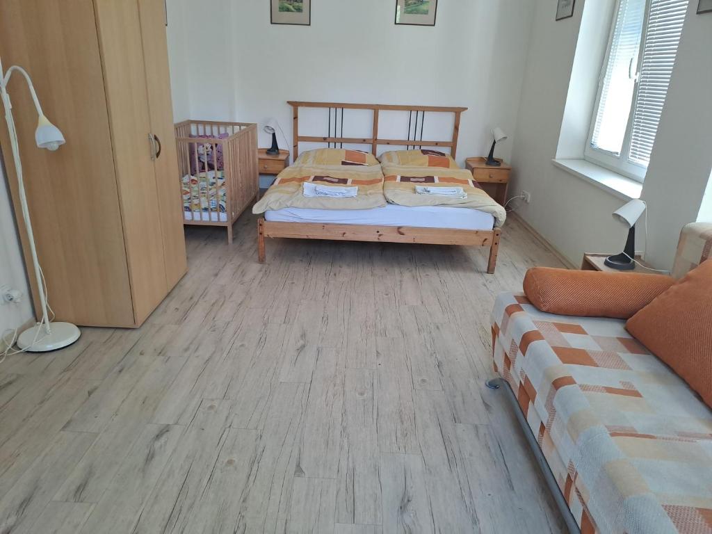 Łóżko lub łóżka w pokoju w obiekcie Villa Vranov 55