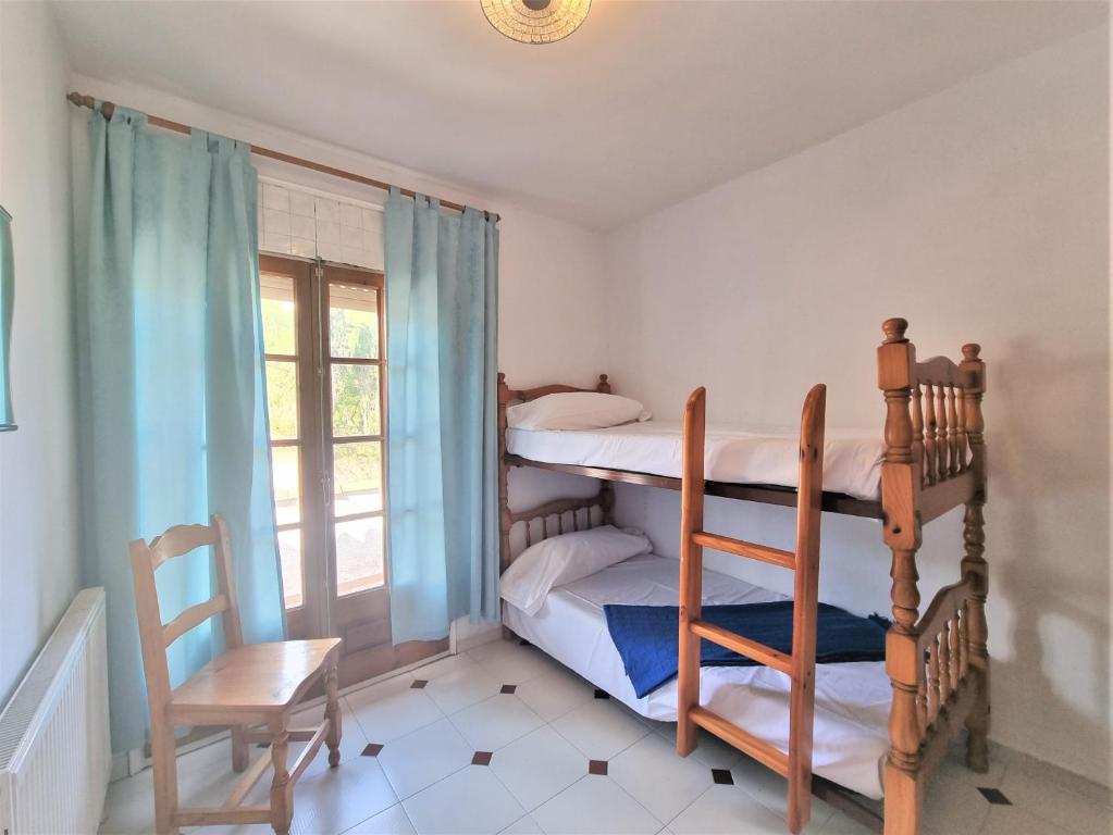 Posteľ alebo postele v izbe v ubytovaní Holiday Home Betty