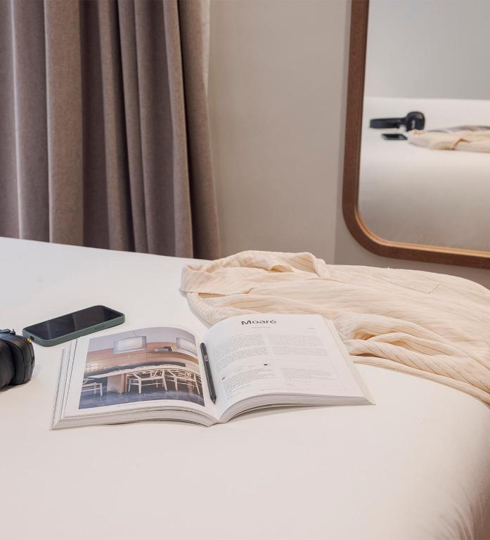 Postel nebo postele na pokoji v ubytování Oliveira Rooms