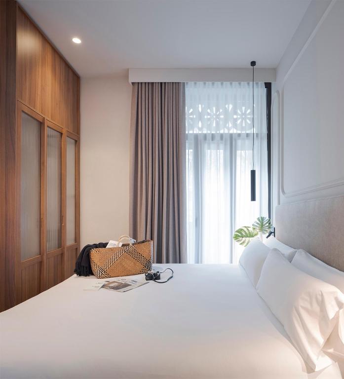 Postel nebo postele na pokoji v ubytování Oliveira Rooms