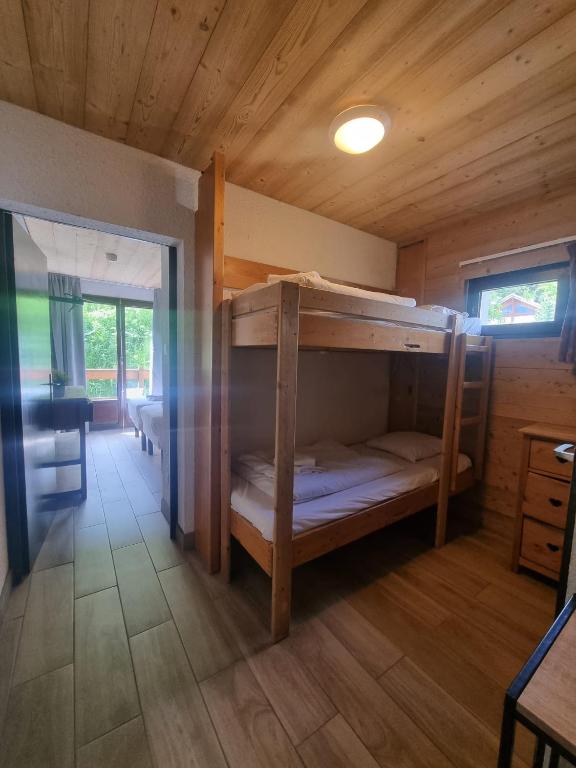 Postel nebo postele na pokoji v ubytování Hotel Le Cairn