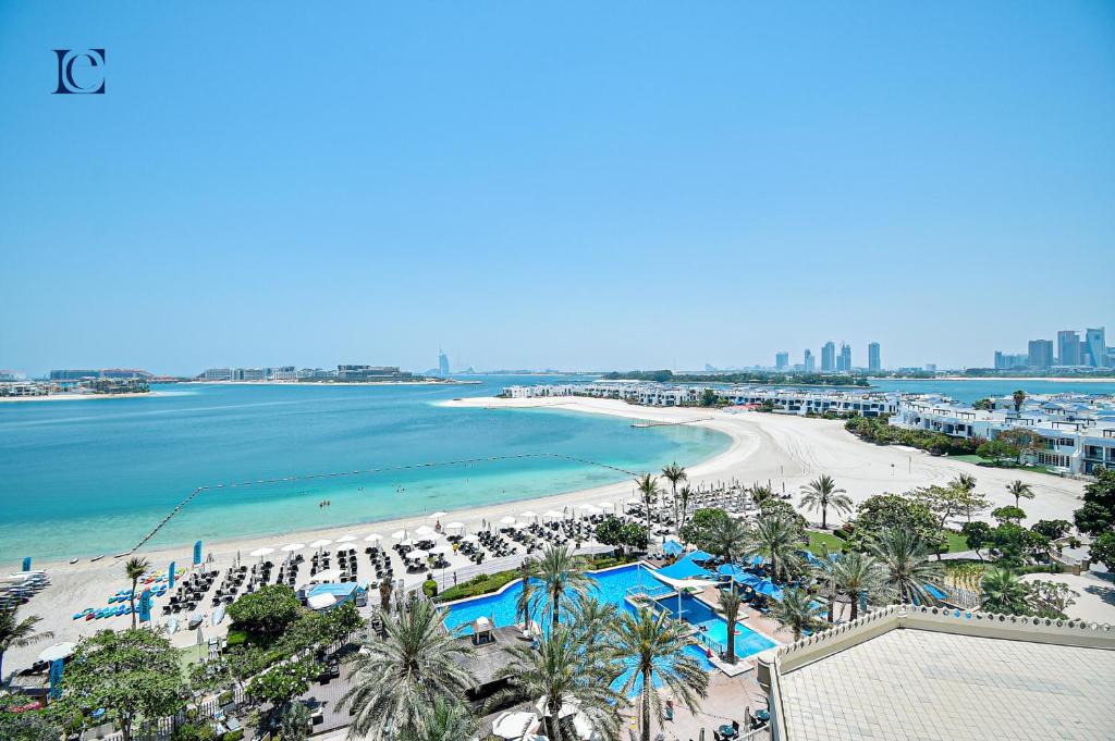 an aerial view of a beach and the ocean at Palm Jumeirah's Spectacular Ocean-View Apartment - NBT in Dubai