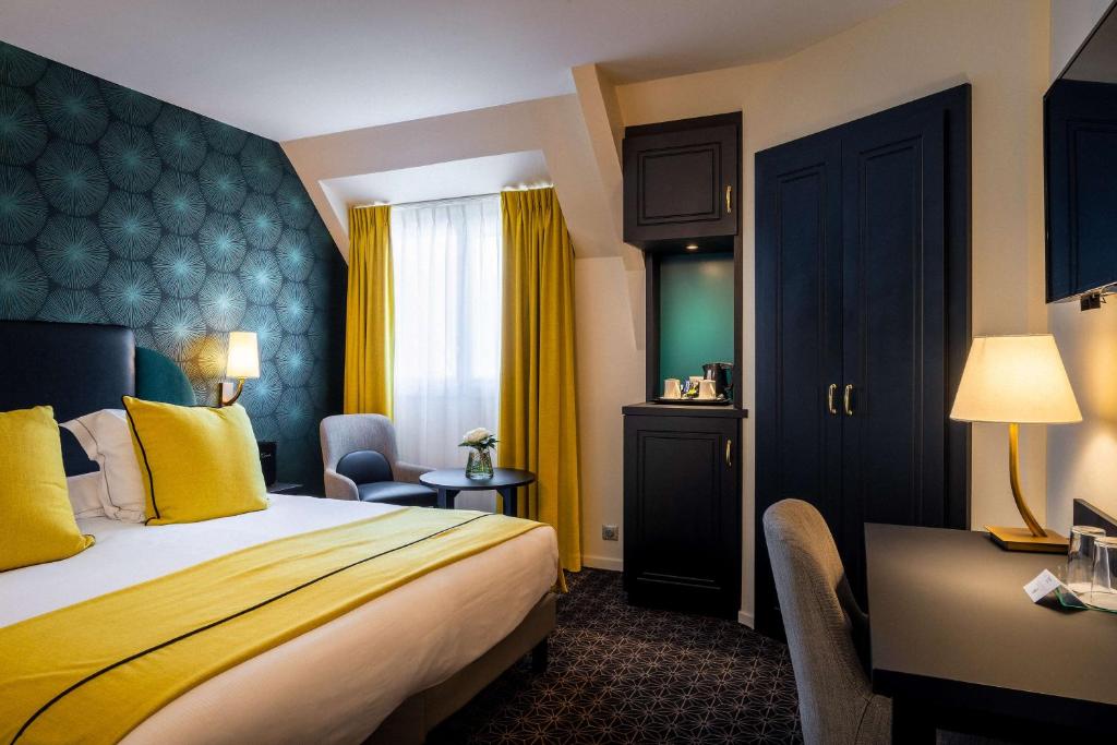 Postel nebo postele na pokoji v ubytování Best Western Plus Le Moderne