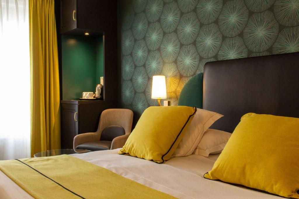 Postel nebo postele na pokoji v ubytování Best Western Plus Le Moderne