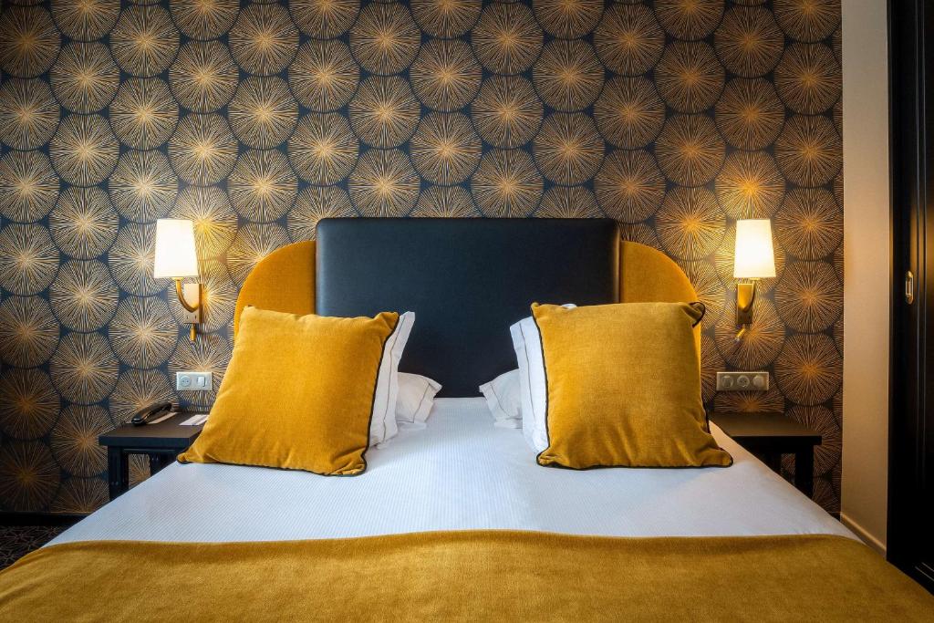 Postel nebo postele na pokoji v ubytování Best Western Plus Le Moderne