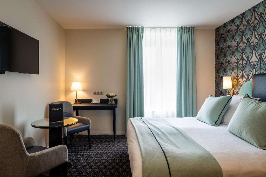 Postel nebo postele na pokoji v ubytování Best Western Plus Le Moderne