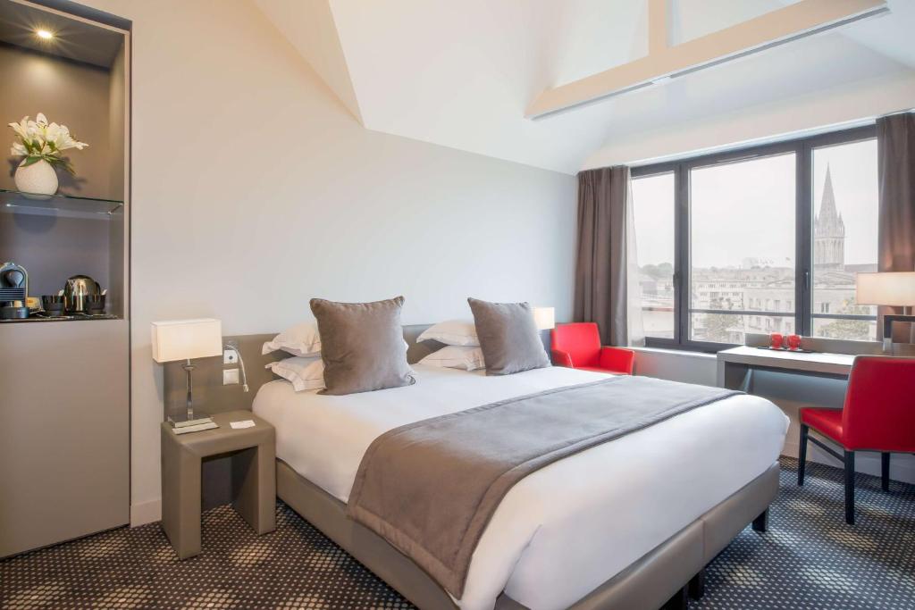 Postel nebo postele na pokoji v ubytování Best Western Plus Le Moderne