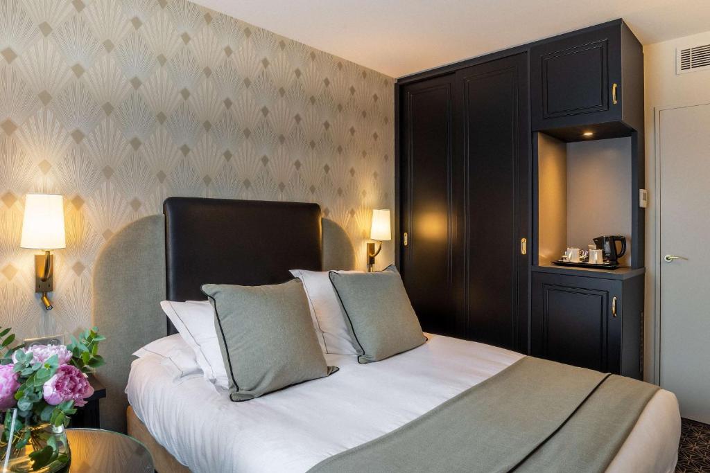 Postel nebo postele na pokoji v ubytování Best Western Plus Le Moderne