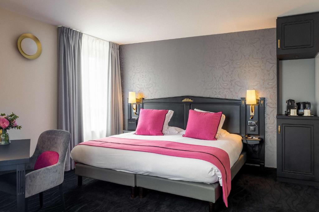 Postel nebo postele na pokoji v ubytování Best Western Plus Le Moderne