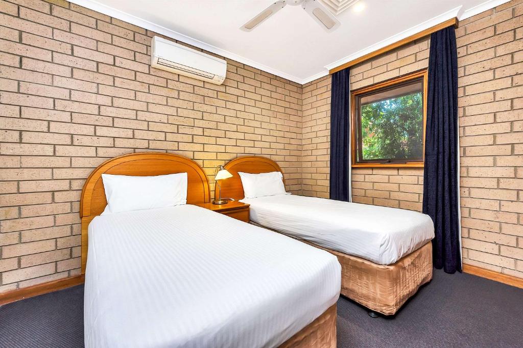 Postel nebo postele na pokoji v ubytování Comfort Inn & Suites Sombrero