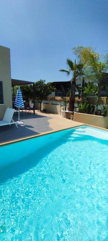 The swimming pool at or close to Chania Olive Home