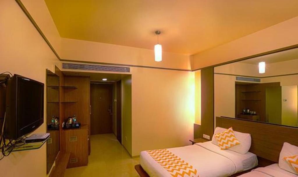 TV a/nebo společenská místnost v ubytování Hotel Prime Ivy Studio