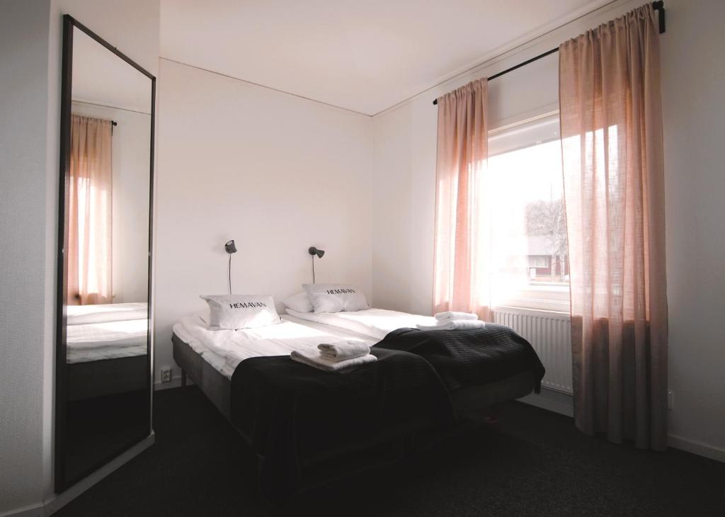 Säng eller sängar i ett rum på STF Hemavans Fjällcenter