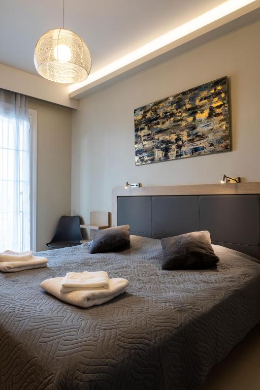Postel nebo postele na pokoji v ubytování ANGELO Cafe Hotel
