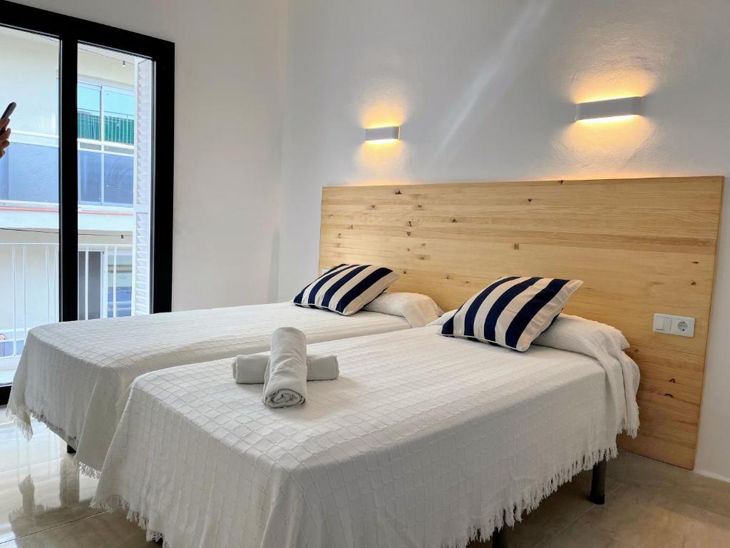 Posteľ alebo postele v izbe v ubytovaní Hotel Casa Mas