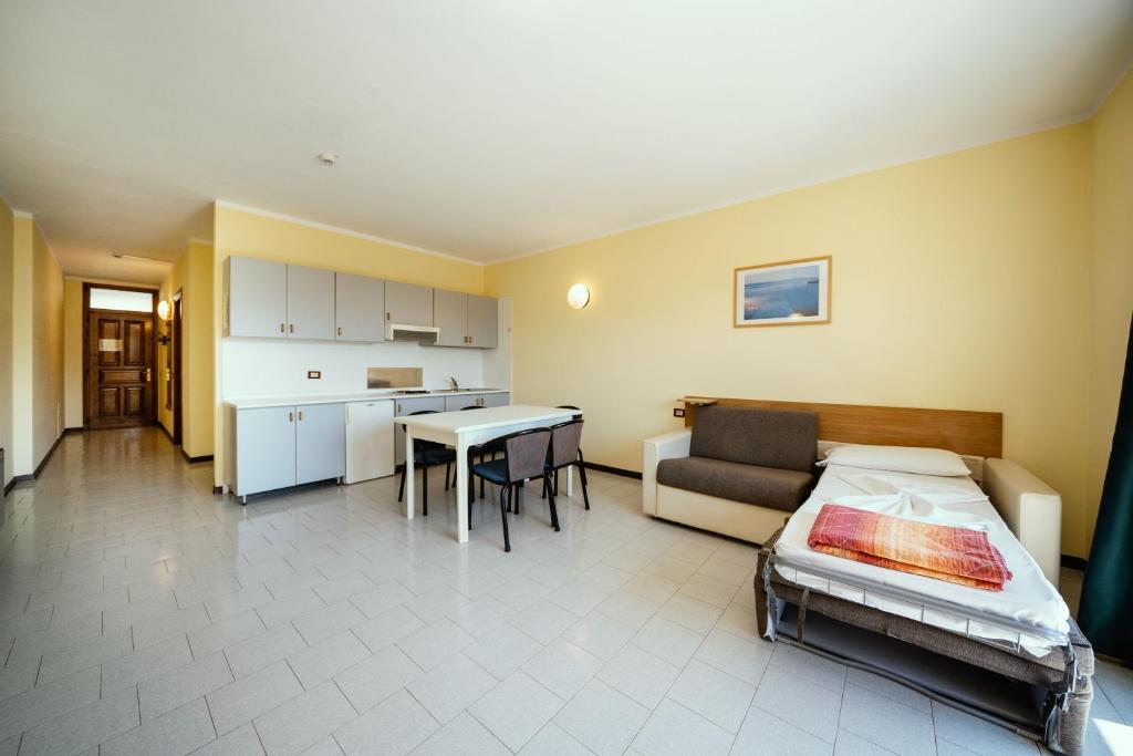 Kuchyň nebo kuchyňský kout v ubytování Hotel Residence Campi