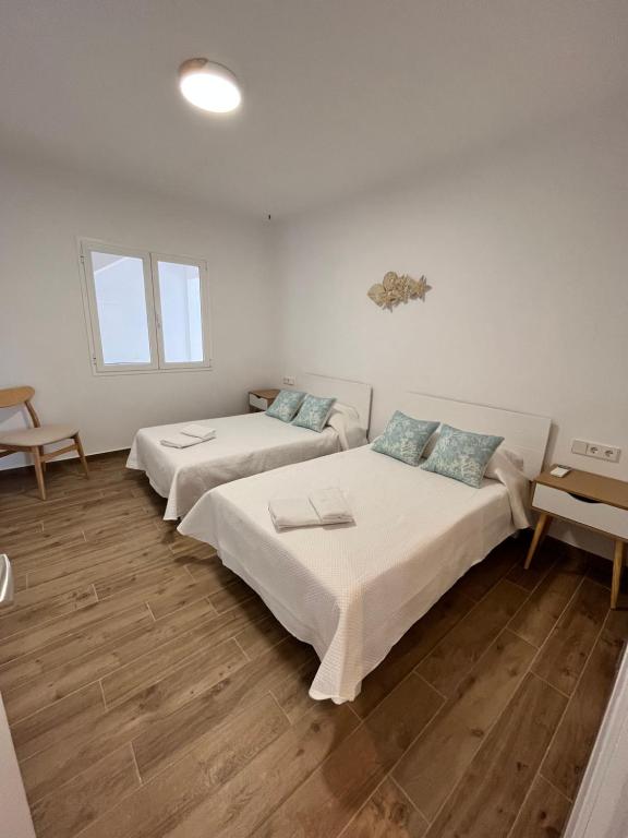 Postel nebo postele na pokoji v ubytování Apartamento en Costamar I, 2ª Planta, 23