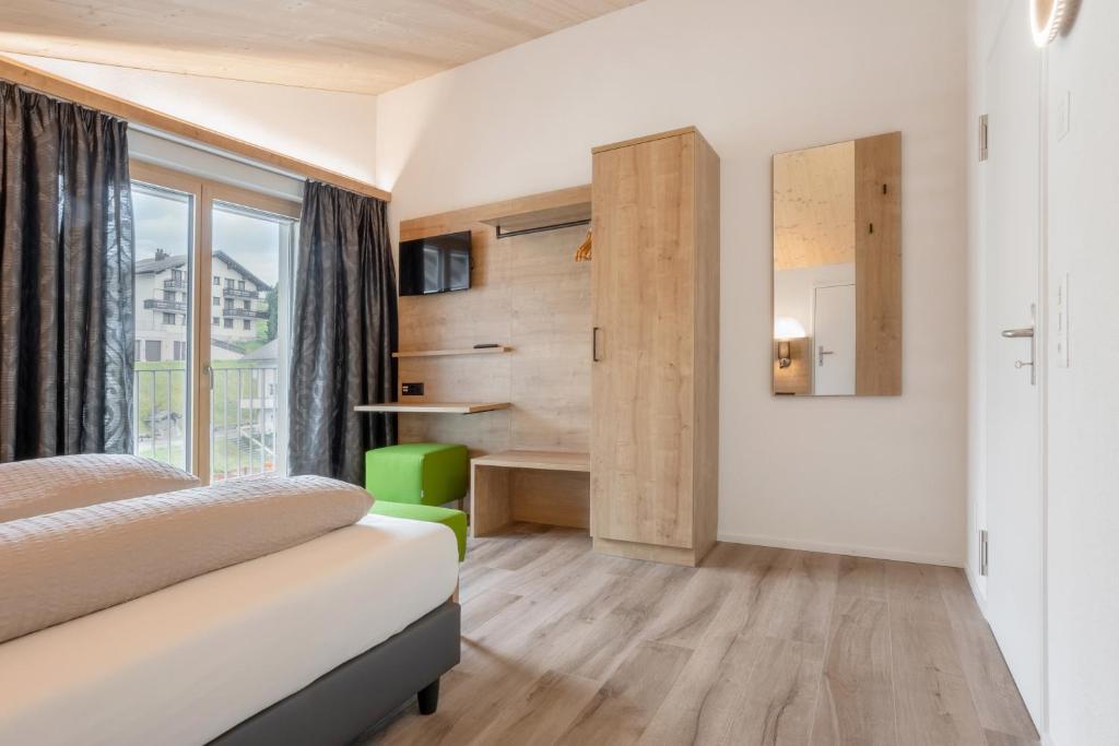Postel nebo postele na pokoji v ubytování Hotel Tannenboden