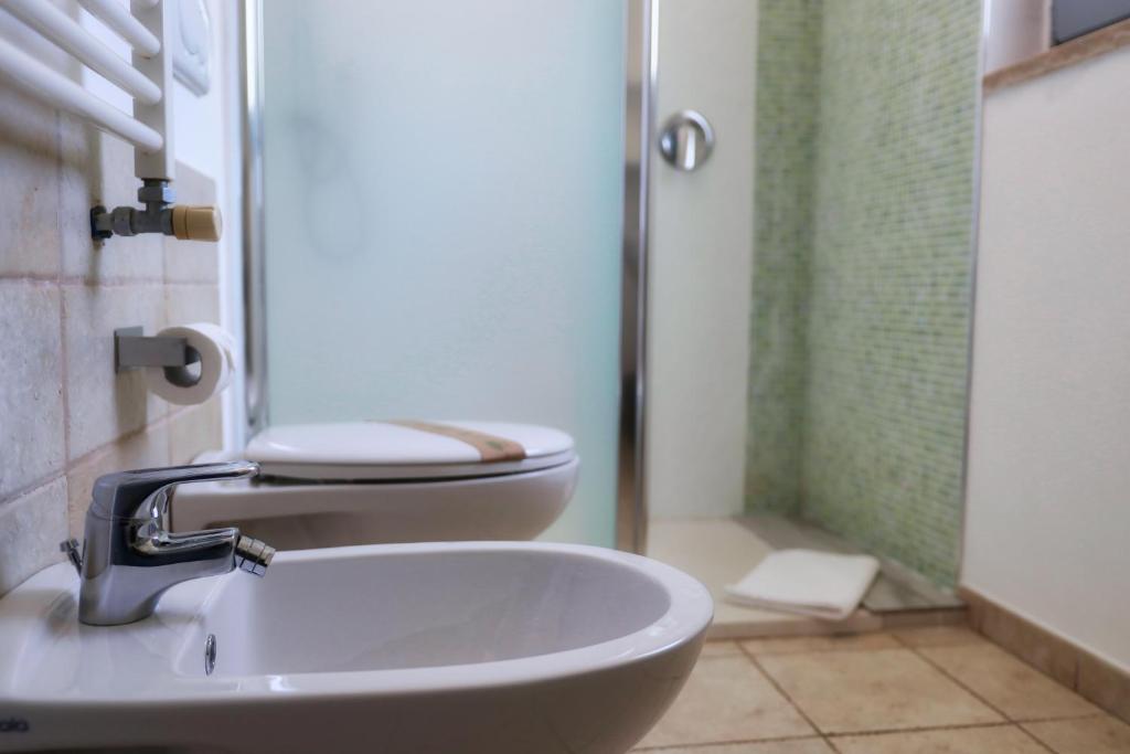 Koupelna v ubytování Masseria Trullo Sovrano Exclusive B&B