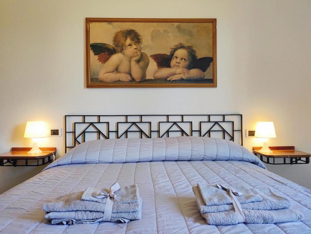 Krevet ili kreveti u jedinici u objektu La Casa di Sciano