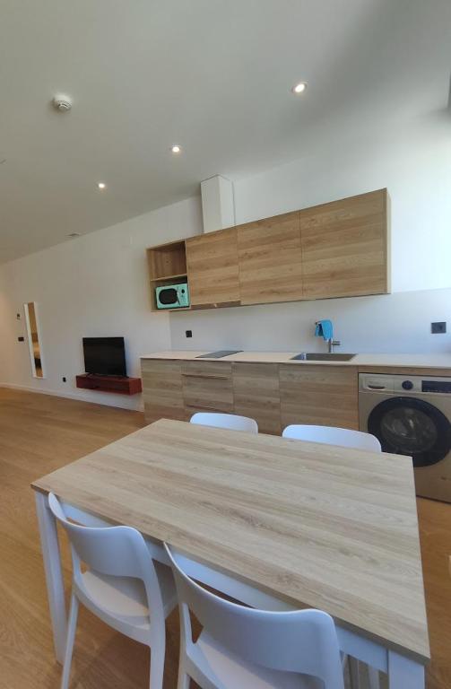 Kuchyňa alebo kuchynka v ubytovaní Apartamentos Pillotegi parking gratuito