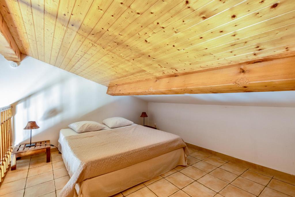 Posteľ alebo postele v izbe v ubytovaní La Rose des Vents & Spa - Gite Savane