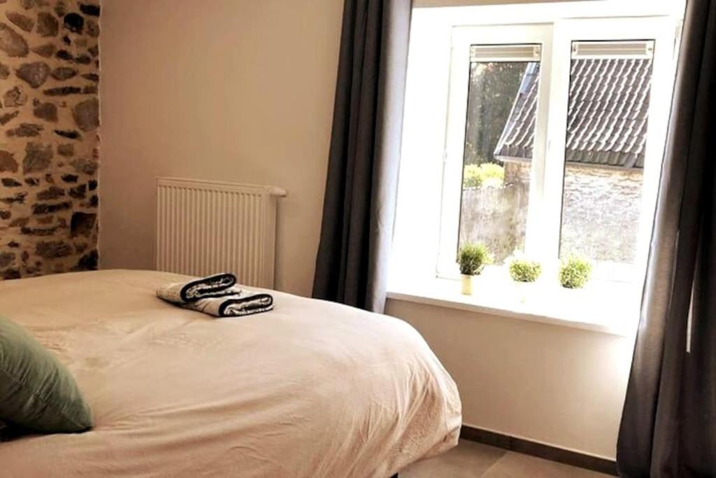 Postel nebo postele na pokoji v ubytování Le Franchimontois Appartement 6p - Theux