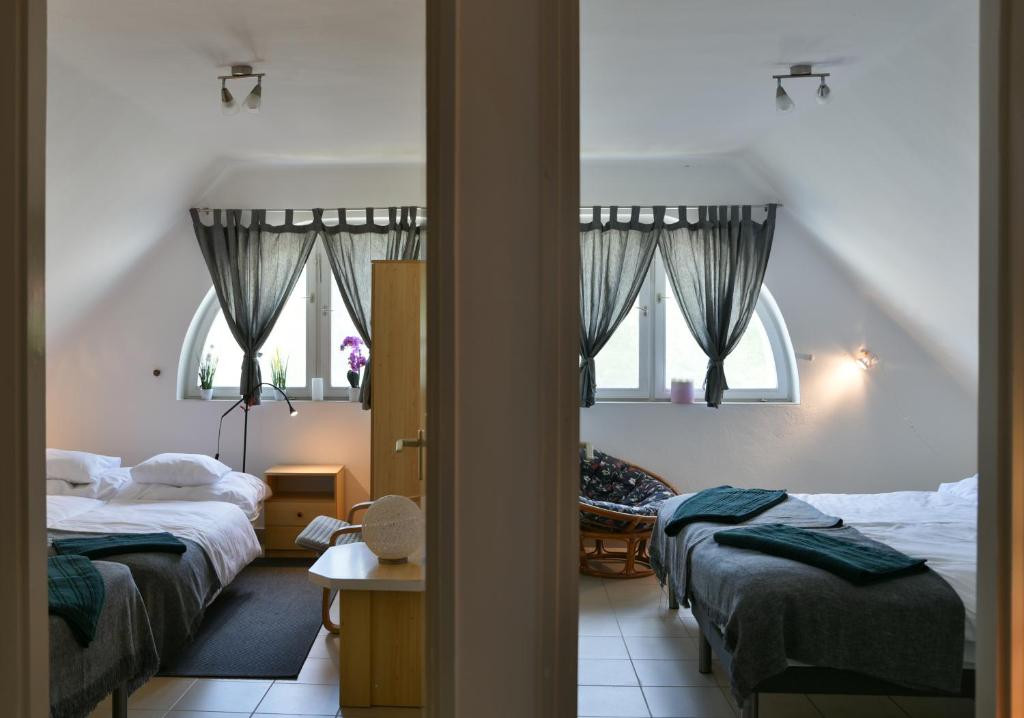 A bed or beds in a room at VillaBeach 50m from the beach