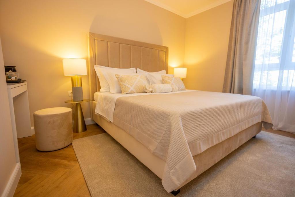 Postel nebo postele na pokoji v ubytování City and Style Luxury Rooms Split