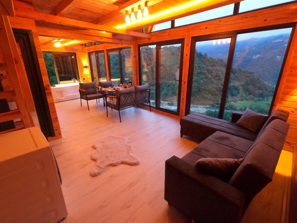 Posezení v ubytování Necran Bungalow اكواخ ايدر