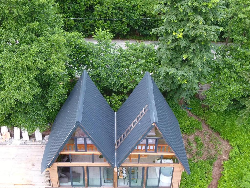 Zahrada ubytování Necran Bungalow اكواخ ايدر