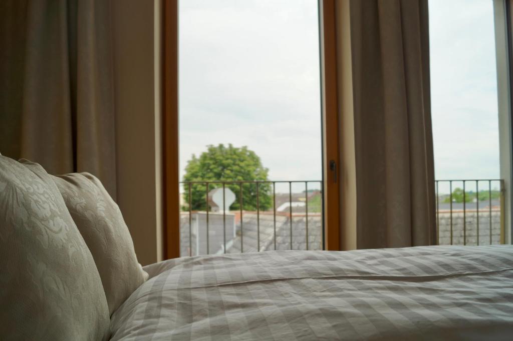 Postel nebo postele na pokoji v ubytování Zimmer am Platz