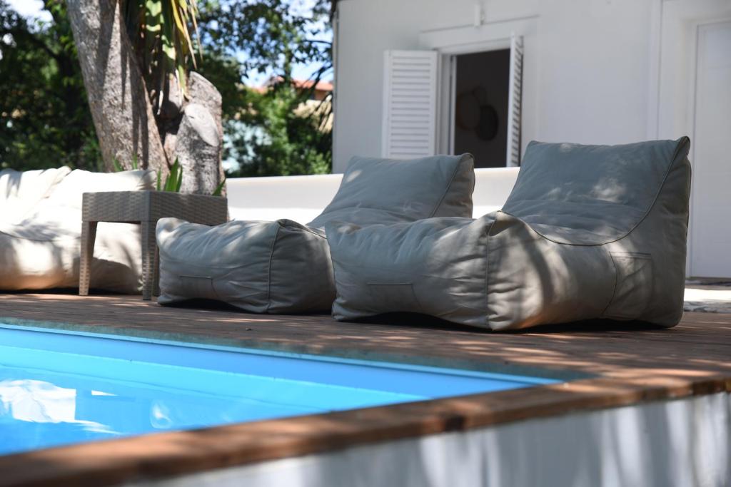 Bazén v ubytování Mr and Mrs White Corfu Couples Retreat Adults Only nebo v jeho okolí