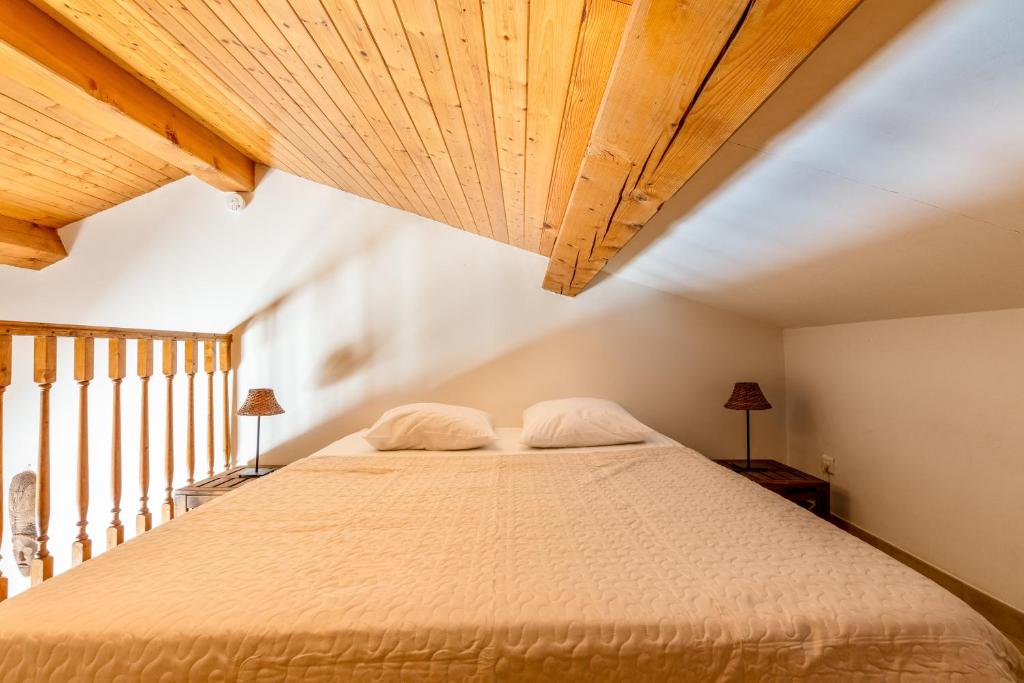 Posteľ alebo postele v izbe v ubytovaní La Rose des Vents & Spa - Gite Savane