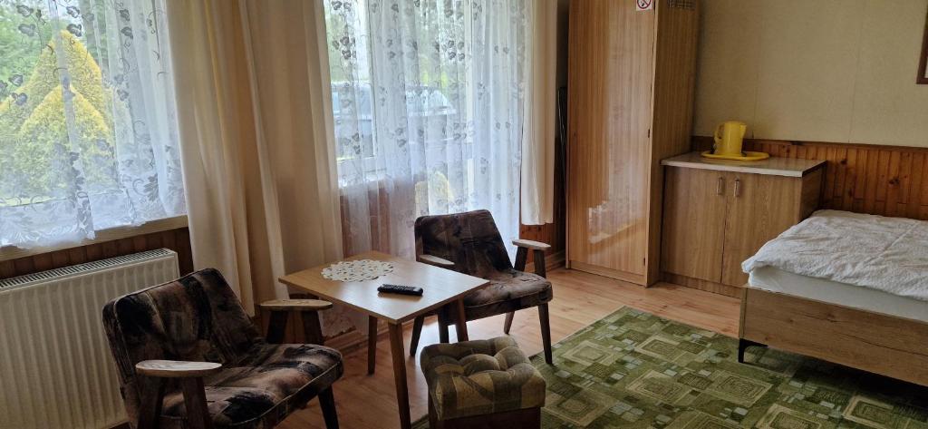 Postel nebo postele na pokoji v ubytování Dom Wczasowy Orka