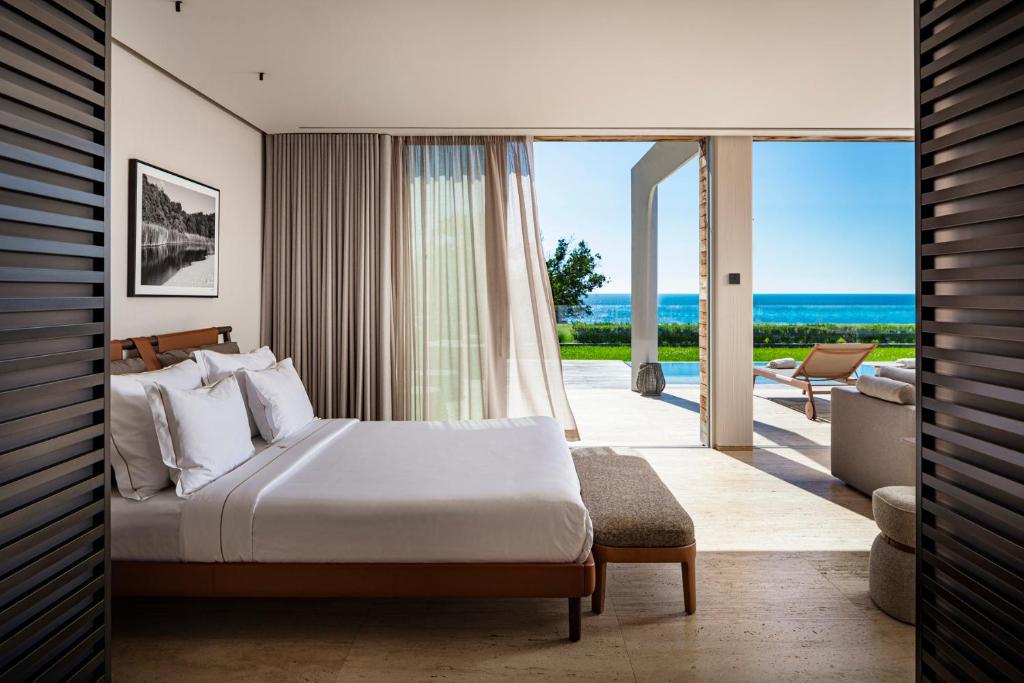 Postel nebo postele na pokoji v ubytování Vaya Beach Resort