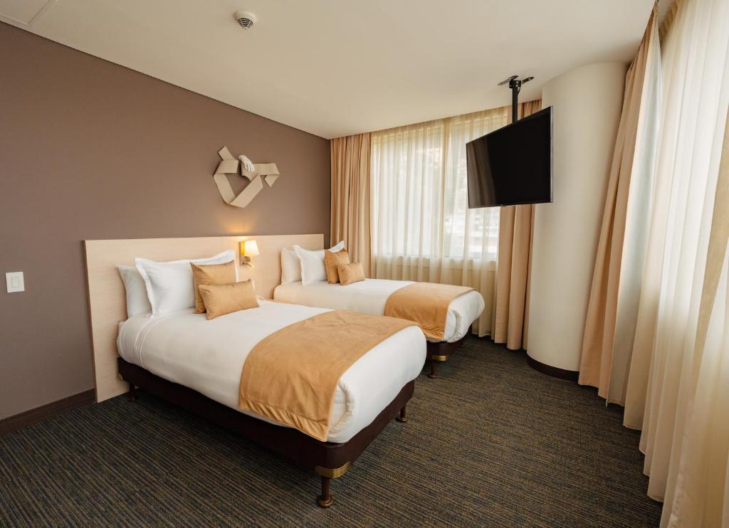 SHG Liv Zona G Hotelにあるベッド