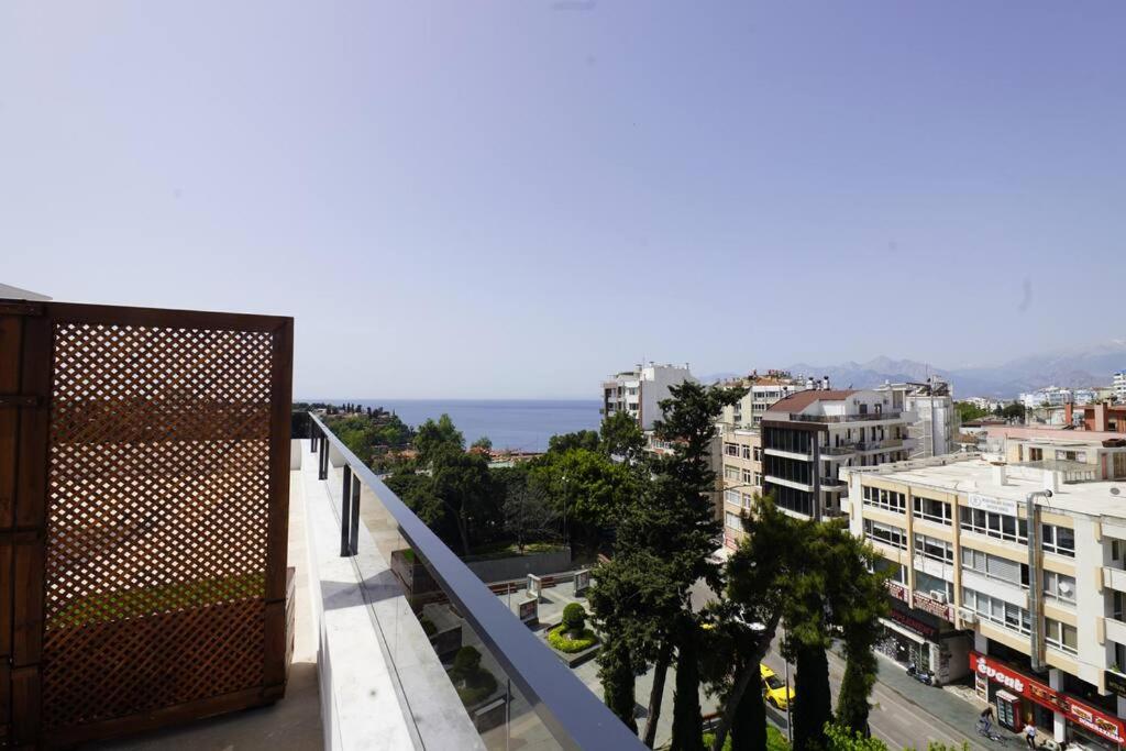 a view of a city from the balcony of a building at Royal Homes 504 in Antalya