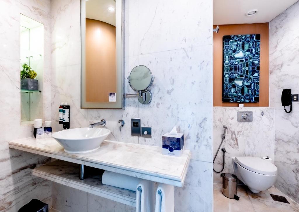 Koupelna v ubytování Media One Hotel
