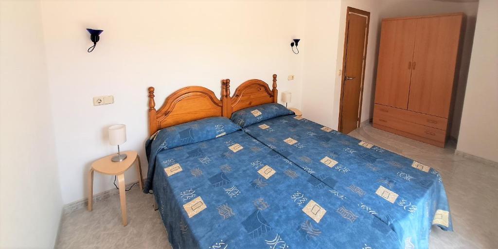 Posteľ alebo postele v izbe v ubytovaní Apartaments Club Nàutic Terral