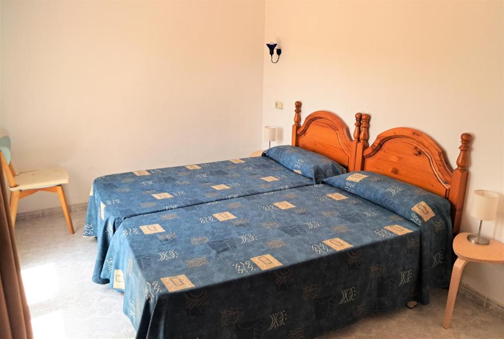 Posteľ alebo postele v izbe v ubytovaní Apartaments Club Nàutic Terral