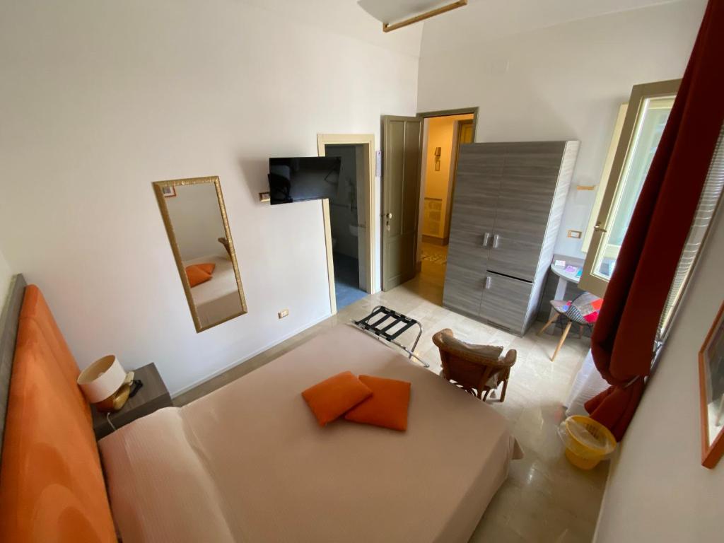 Letto o letti in una camera di Albergo Bouganville