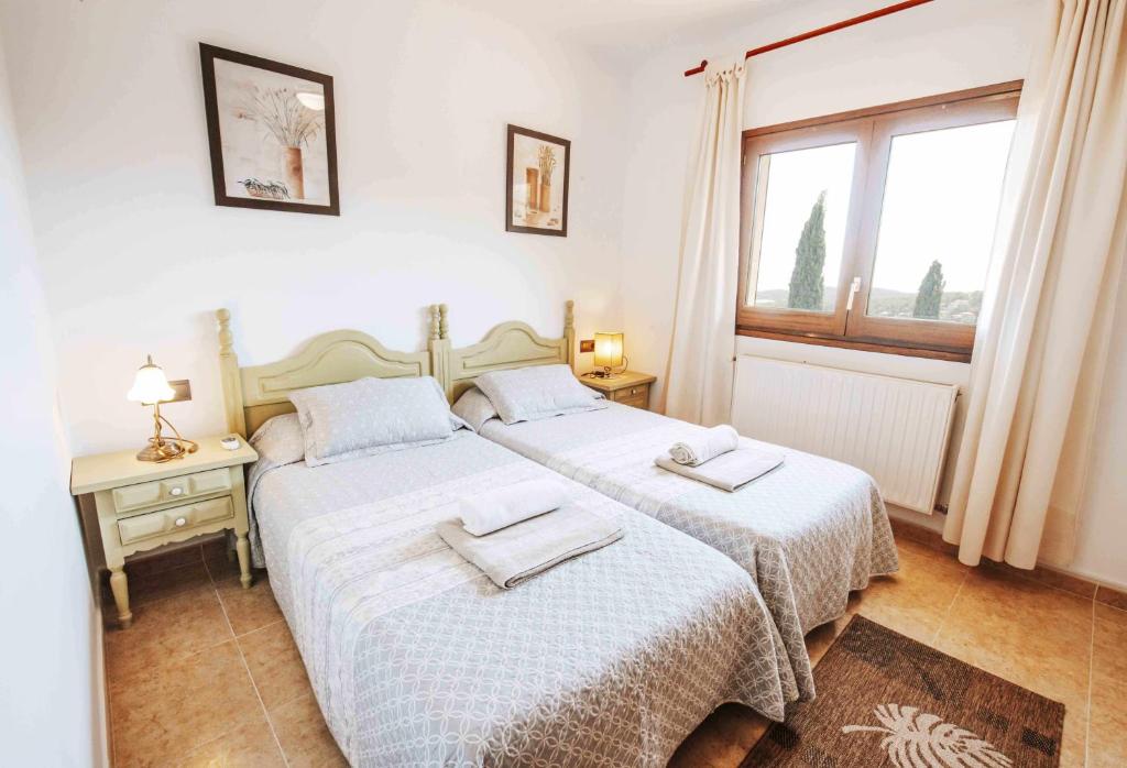 Postel nebo postele na pokoji v ubytování Can Lari Chalet