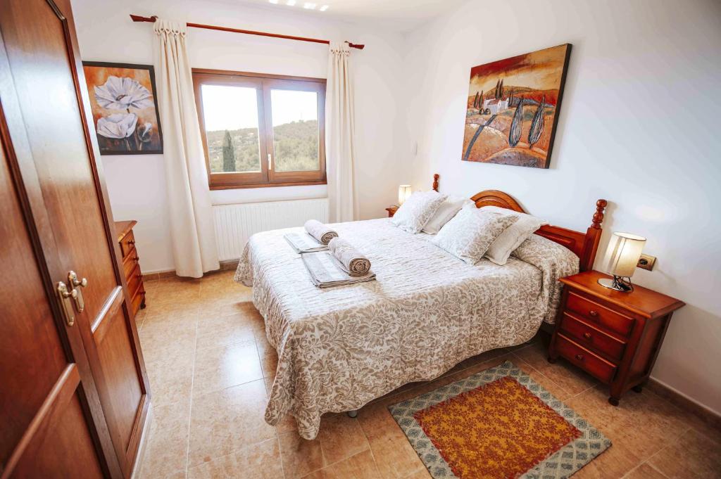 Postel nebo postele na pokoji v ubytování Can Lari Chalet