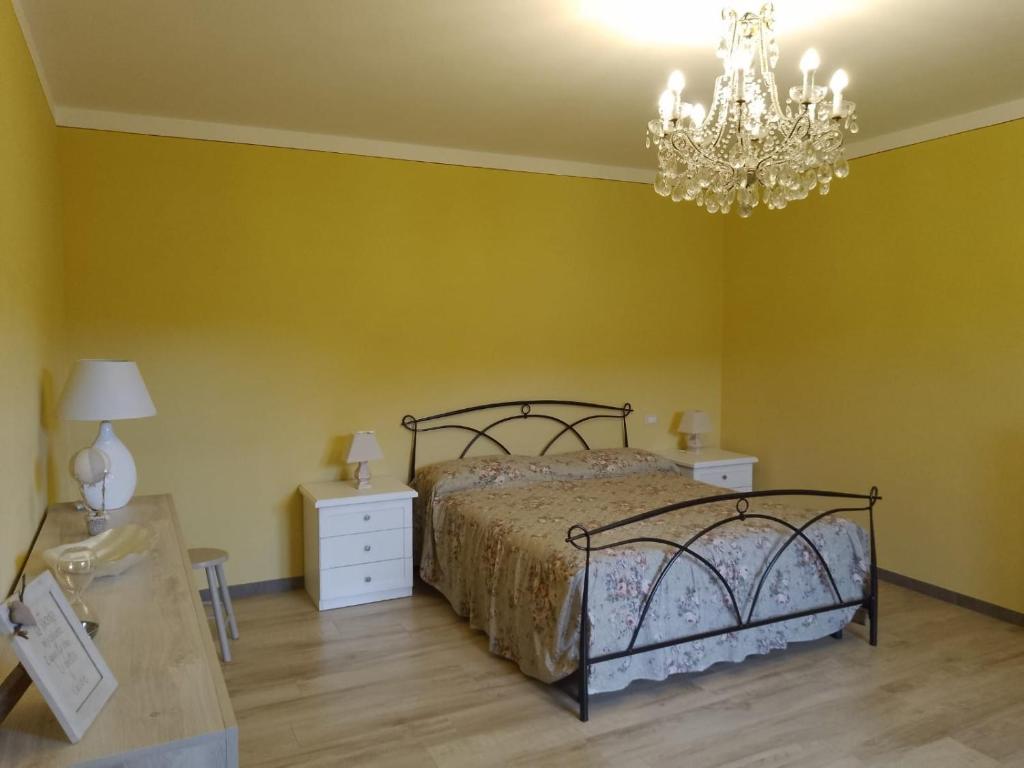 Postel nebo postele na pokoji v ubytování Le sette fontane